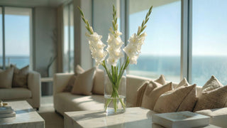 Anchor stems forming the base structure of a floral arrangement with soft cream peonies and greenery