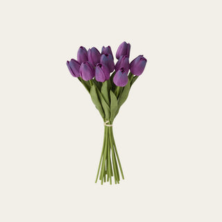 Dark purple real touch tulip bundle shown in full view with 12 petite tulip stems, faux green leaves, and saturated purple blooms for small vases, spring arrangements, fall styling, and compact floral displays.