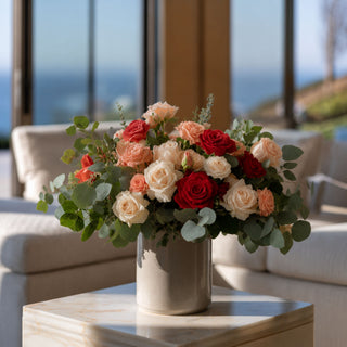 Red True Bloom Real Touch rose bundle styled with blush florals, greenery, and layered romantic centerpiece styling for elegant year-round floral arrangements.