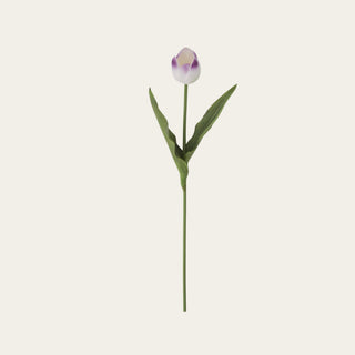 White and purple real touch tulip stem shown in full view with a closed two-tone tulip bloom, broad faux green leaves, and a wired green stem for petite vases, spring arrangements, narrow-neck vessels, and soft floral styling.