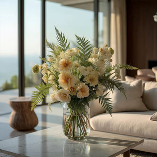31 Inch Parsley fern greenery layered in faux floral arrangement with cream blooms in glass vase on coffee table in sunlit living room