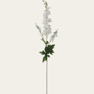 Single 36-inch White True Bloom Real Touch delphinium stem with layered white blooms, lifelike foliage, and flexible wired stem for airy floral arrangements and year-round garden-inspired styling because white florals blend naturally with both seasonal greenery and transitional palettes.