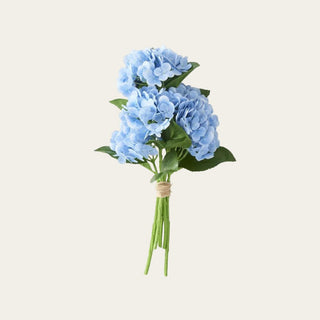 Blue real touch hydrangea 6-stem bundle with soft sky-blue petals, green leaves, and separable non-wired faux stems