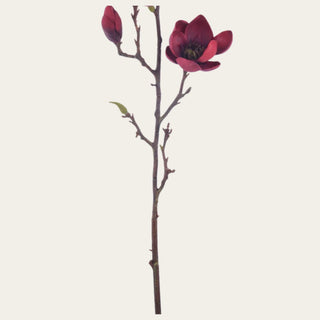 Stem detail of an artificial burgundy faux magnolia tree branch showing realistic wired branching and lifelike faux magnolia blooms for luxury home décor.