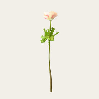 Side profile of an artificial light peach Real Touch anemone stem showcasing realistic petals, wired stem, and natural foliage.