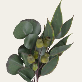 Close-up of an artificial mixed eucalyptus bundle showcasing realistic faux eucalyptus leaves, natural green seed pods, and layered botanical textures for designer floral arrangements.