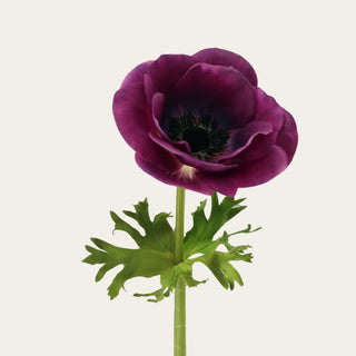 Close-up of an artificial mulberry purple Real Touch anemone flower showcasing realistic petals and detailed botanical center.