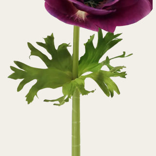 Stem detail of an artificial mulberry purple Real Touch anemone featuring wired construction, realistic foliage, and lifelike botanical design.