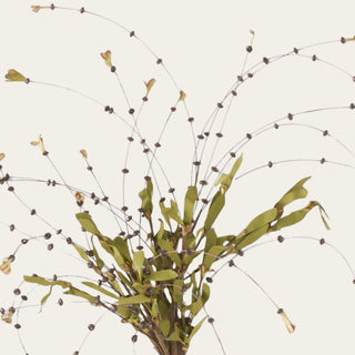 Close-up of an artificial olive green bead bud spray featuring realistic faux foliage, delicate bead accents, and airy botanical texture.