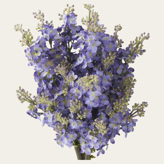 Close-up of an artificial purple faux lilac bundle highlighting delicate clustered blossoms, Real Touch greenery, and realistic botanical detail for elegant floral arrangements.