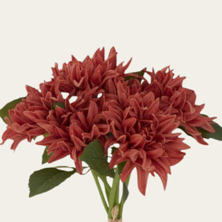 Close-up of artificial Real Touch dark orange dahlia blooms showcasing realistic layered petals, rich autumn-inspired color, and lifelike faux floral texture for designer arrangements.