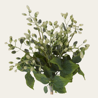 Close-up of an artificial White Berry & Herb Bundle highlighting realistic white berry clusters, textured green leaves, and natural botanical detail.