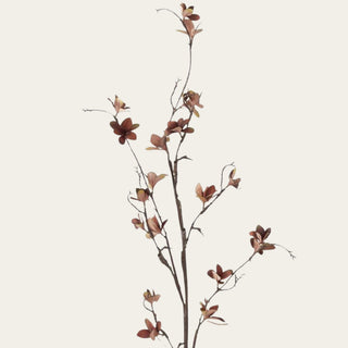 Close-up of the burgundy brown faux magnolia blossom spray highlighting softly shaped blossoms, realistic branching, and natural seasonal color.