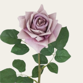 Close-up of a light purple True Bloom real touch duchess rose bloom with layered lavender-purple petals, faux green leaves, and soft romantic color. 