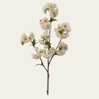 Single 41-inch creamy white True Bloom real touch blossom branch with layered ivory-white blooms, green leaves, and a slender brown branch
