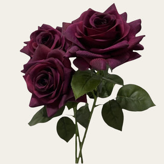 Close-up of the Deep Plum Real Touch Duchess Rose showing its densely layered petals, rich wine-plum coloration, tonal variation, and tactile Real Touch floral texture.