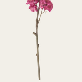 Detailed view of fuchsia cherry blossom faux stem with bendable branch structure, ideal for shaping arrangements in blue and white vessels, compotes, footed bowls, and everyday vases for spring and summer styling.