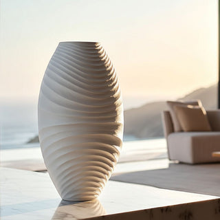 White textured statement vase on a table with a blurred outdoor background by True Bloom floral