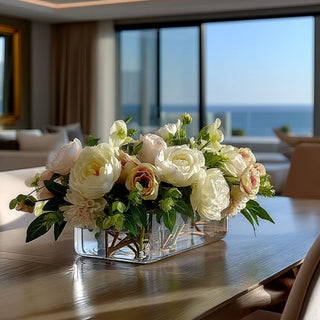 Luxury 25 inch Cafe Au Lait True Bloom Real Touch floral arrangement styled on a dining table featuring ivory peonies, blush roses, cream dahlias, hellebores, and fresh greenery in a thick-cut glass vase with permanent acrylic water. Elegant year-round centerpiece for spring, summer, fall, winter, and holiday decorating.