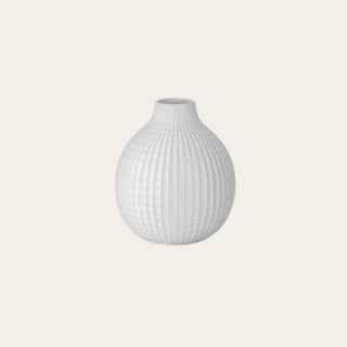 Small Glossy White Woven Ceramic Bud Vase with raised textured finish and petite 1.25 inch opening, designed for narrow-neck faux floral styling with single stems, small greenery, tulips, and seasonal accents.