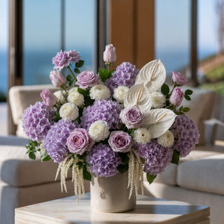 Light Purple True Bloom Real Touch Rose Bud Bundle styled with white florals and greenery in a decorative vase, creating a romantic arrangement filled with soft lavender tones, texture, and elegant year-round styling.