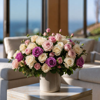 Light Purple True Bloom Real Touch rose bundle styled with blush florals, cream roses, and layered greenery in a romantic centerpiece arrangement for elegant year-round floral styling.
