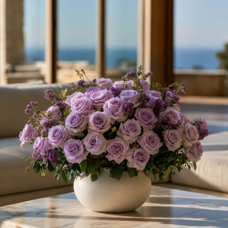 Light Purple True Bloom Austin rose stems styled with layered lavender florals, cream blooms, and airy greenery in a romantic garden-inspired arrangement for elegant year-round floral styling.