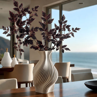 True Bloom Floral 32-inch plum Cimicifuga artificial leaf branches styled in a sculptural white vase in a modern luxury home with coastal views.
