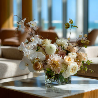 White True Bloom Real Touch Austin rose stems arranged in a clear glass vase with layered ivory florals and soft greenery for an elegant year-round faux floral centerpiece