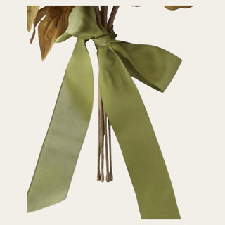 Close-up of the Sunset Peony, Dahlia and Sunflower faux floral bundle showing the olive green ribbon, gathered stems, and handcrafted bouquet construction ready for vase styling.