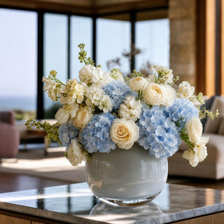 Light Blue real touch hydrangea 6-stem bundle styled in a white vase on a modern kitchen island, creating a fresh year-round faux floral arrangement that works beautifully with spring greenery, summer neutrals, fall warm tones, and winter or holiday styling.