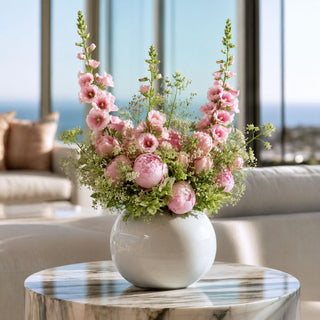 True bloom floral pink hollyhock stems mixed with other florals in a luxury floral arrangement; works beautifully in spring, summer, and fall because the saturated fuchsia blooms create focal contrast while softer florals balance the overall design.