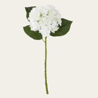 White True Bloom real touch hydrangea stem with a full rounded bloom, faux green leaves, and a faux stem, ideal for year-round floral arrangements because its crisp white color pairs beautifully with spring pastels, summer greenery, fall neutrals, winter whites, and holiday florals.