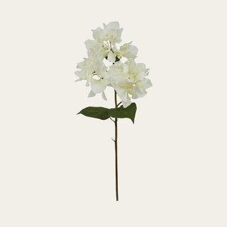 White faux bougainvillea stem shown in full view with layered white blooms, green leaves, and a wired flexible stem for minimalist year-round, bridal, and holiday floral arrangements.