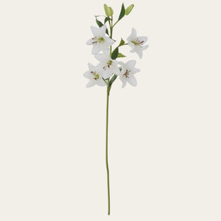 White real touch lily stem with 5 open blooms, 3 buds, faux green leaves, and a bendable stem, ideal for year-round floral arrangements because its crisp white color pairs easily with spring pastels, summer greenery, fall neutrals, and winter or holiday styling. 