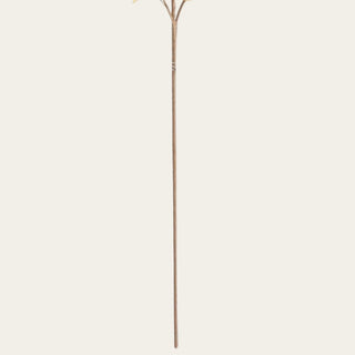 Detailed view of the yellow eucalyptus faux stem showing its long wired construction, flexible shape, and slim branch structure for controlled placement in arrangements.