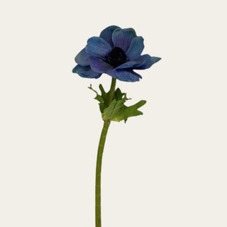 Zoomed in dark blue real touch anemone stem with realistic petals and dark center, 17.5-inch faux floral stem photographed on a white background for home decorating and floral arrangements
