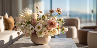 A highly luxurious faux floral arrangement by True Bloom Floral with cream, rose and yellow florals