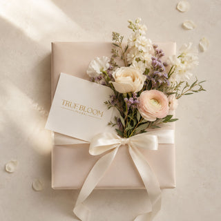 True Bloom Floral digital e-gift card for real-touch faux flowers, with a blush and cream arrangement and satin ribbon — a gift for weddings, birthdays or no occasion at all other than just because.