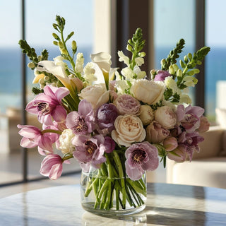 Luxury faux floral arrangement with pink orchids, blush roses, and white blooms in a glass vase by True Bloom Floral™, featuring realistic artificial flowers styled in a modern interior